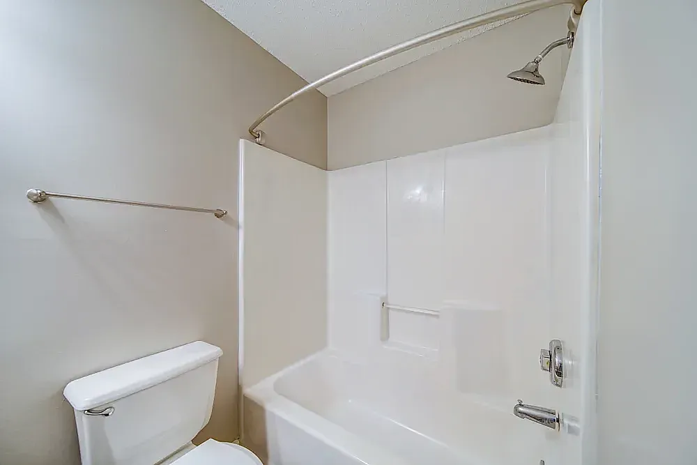 Bathroom, white subway tile surround, alcove bathtub and shower, chrome fixtures