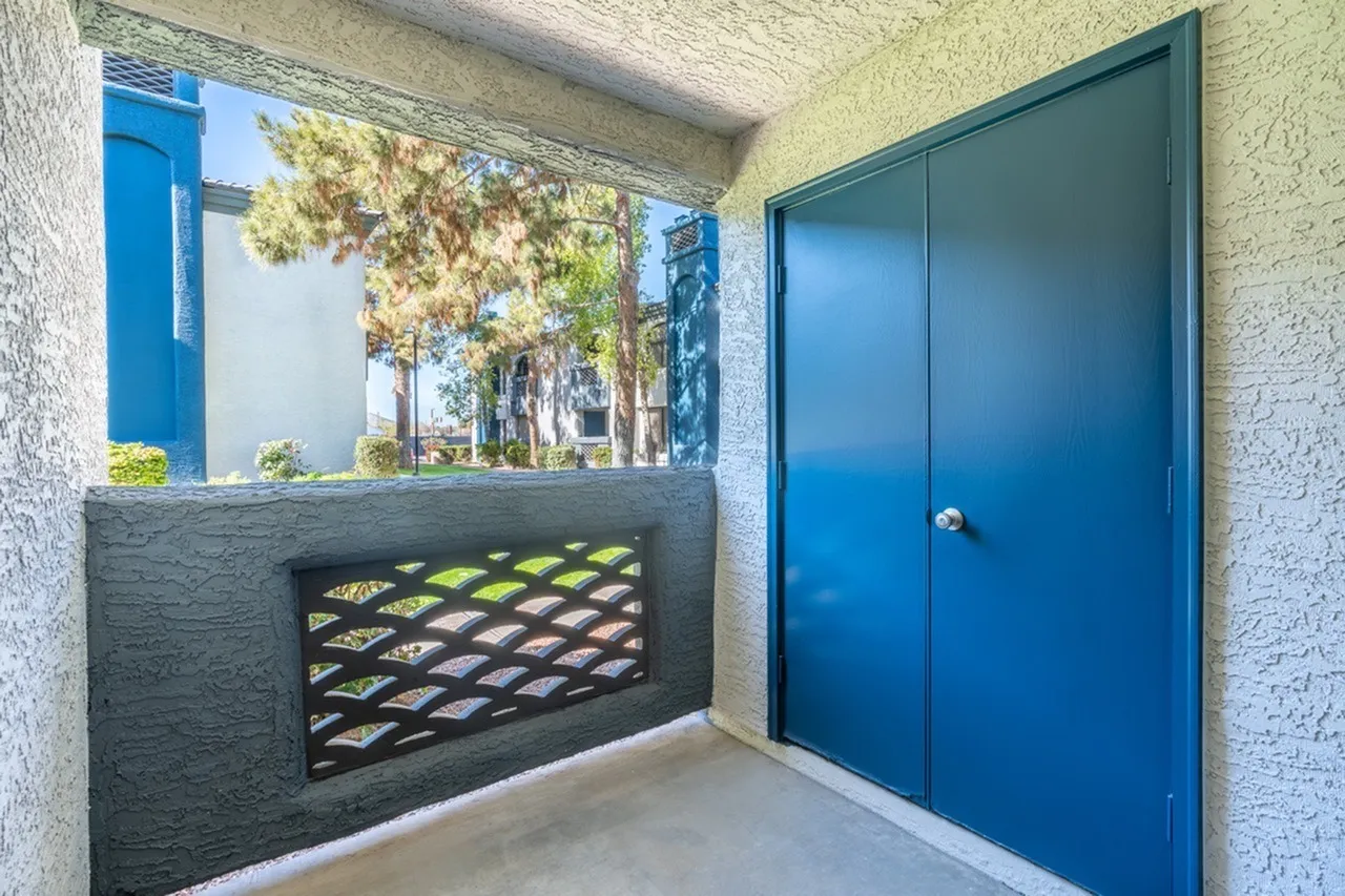 Private patio, extra storage, decorative block wall, mature trees