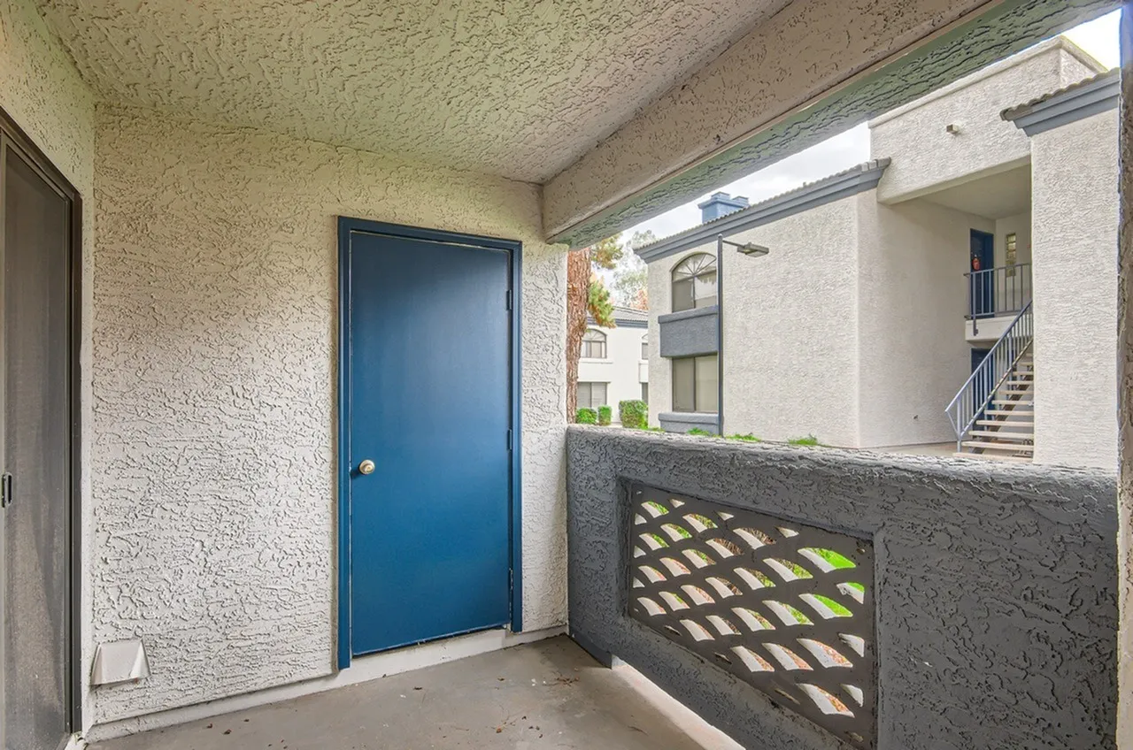 Patio entry, extra storage, decorative block wall, stucco exterior