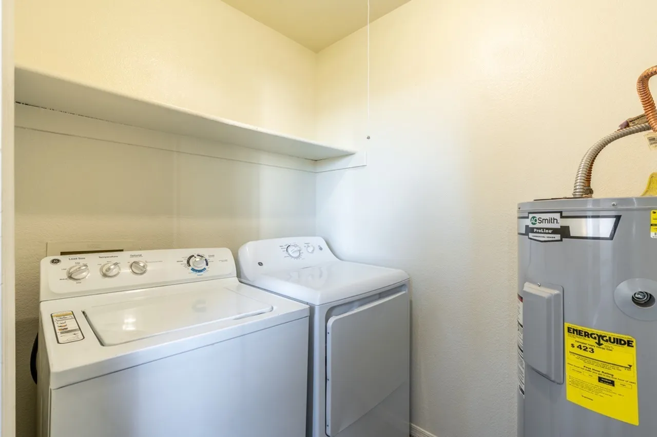 Laundry closet, washer and dryer, overhead shelf